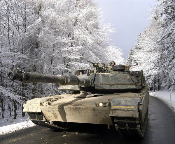 Tankers drive an M1A1 Abrams through the Taunus Mountains north of Frankfurt during Exercise Ready Crucible in February 2005.