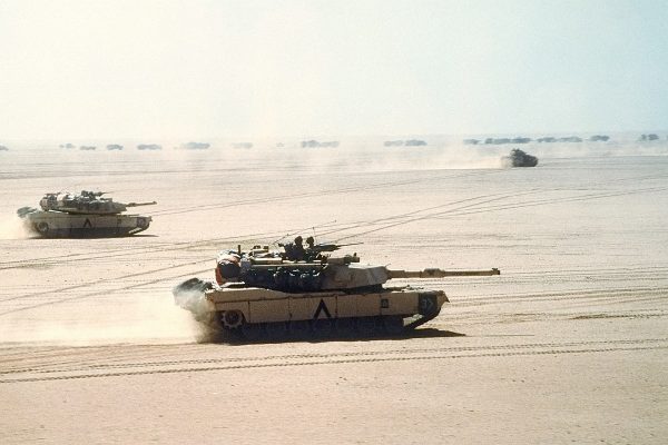 Abrams tanks move out on a mission during Desert Storm in 1991.