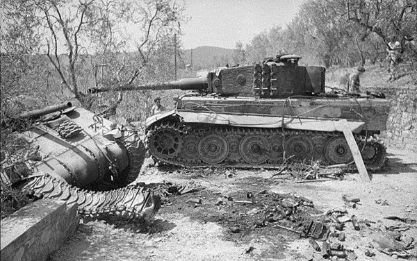 Tiger I and a M4 Sherman, knocked out side by side in Italy.