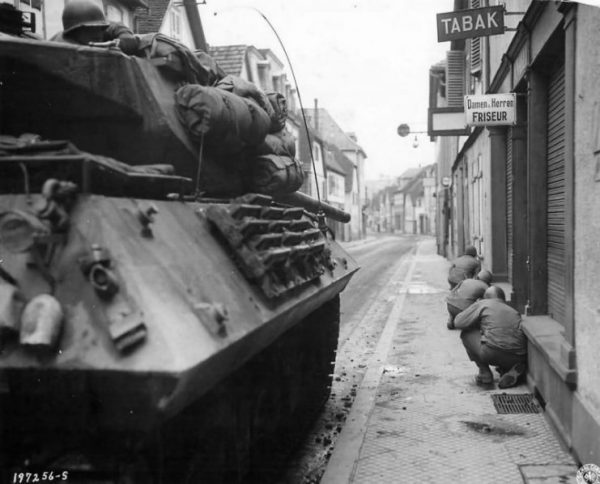 157th Infantry Regiment Supported By M10 Tank Destroyers Of A Company 645th Tank Destroyer Battalion Under Fire In Town Of Niederbronn France