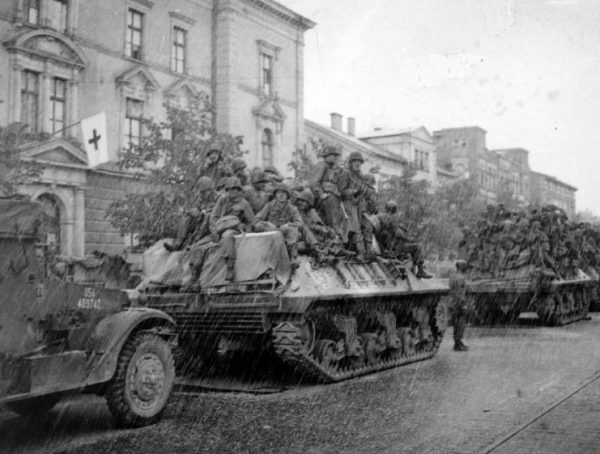 M36 and 3rd Division troops move to the front in hailstorm at Augsburg, Germany April 1945