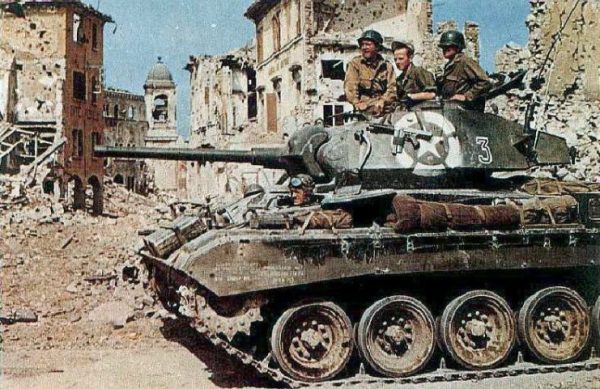 M24 Chaffee of the 81st Reconnaissance Squadron, 1st Armored Division passes through ruins of Vergato (Bologna, Italy) on 14 April 1945