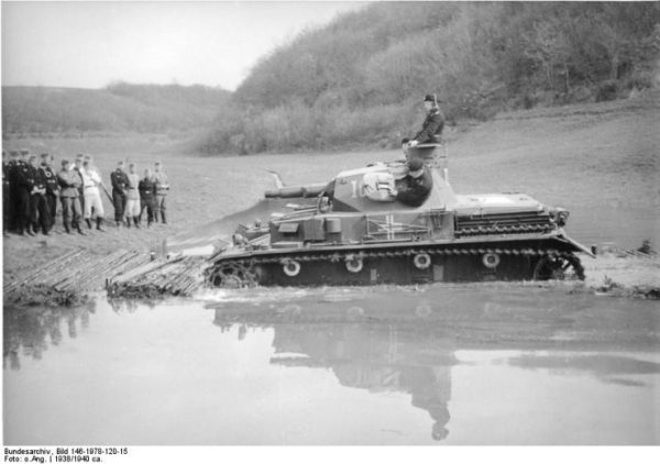 A Panzer IV-A performing a water crossing exercise demonstration while being observed by Wehrmacht officers on the shore. Bundesarchiv, Bild 146-1978-120-15 CC-BY-SA 3.0