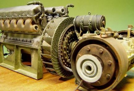 From left to right, the V-2-34 diesel engine, the clutch, and the transmission. The black “barrel” is the engine’s starter motor.)