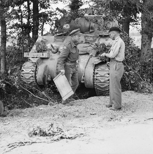 A Sherman tank in British service photographed in Normandy on August 15th, 1944.
