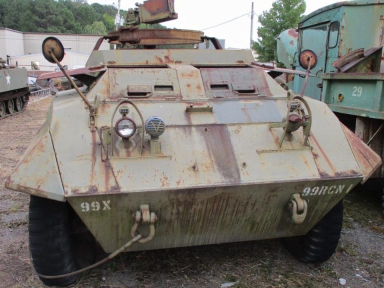 Auction of Military Surplus Includes a Halftrack, M20, 6 Willys Jeeps