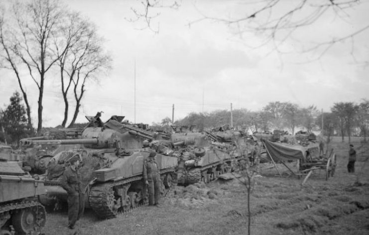 Sherman Fireflies with “60 lb” air-to-ground rockets on rails attached to the turret