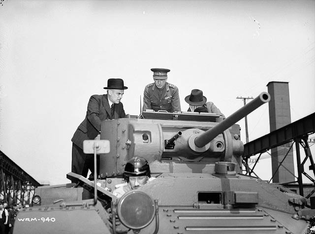 The first tank to be manufactured in Canada, a Valentine VI, being inspected by C D Howe the Canadian Minister of Munitions and Supply in May 1941